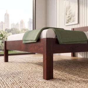 wooden single bed close-up view